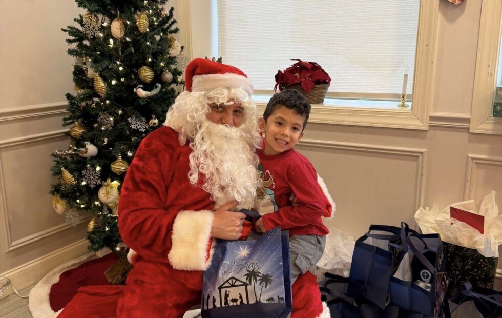 Santa Claus visiting God’s Children Academy
